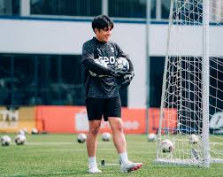 Goalkeeper with ball